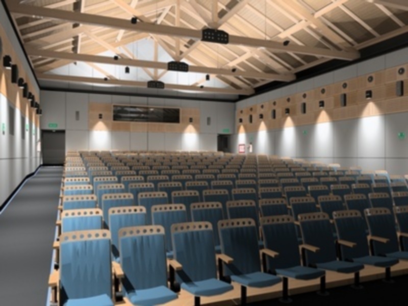 Salón con asientos azules, iluminación de techo y puerta en el fondo.