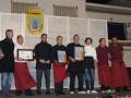 Premiación de chefs y personal del restaurante en una ceremonia oficial.