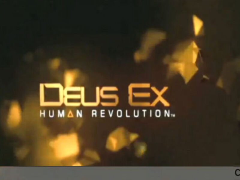 Logo de Deus Ex: Human Revolution con efectos de fuego en el fondo.