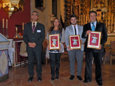 Provincia.El Profesor e Historiador D. Manuel Morales Morales, pronuncio una disertación, sobre el canto de la Sentencia de Pilatos en la Hermandad de Jesús Nazareno de Alcalá del Río.