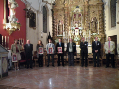 Provincia.El Profesor e Historiador D. Manuel Morales Morales, pronuncio una disertación, sobre el canto de la Sentencia de Pilatos en la Hermandad de Jesús Nazareno de Alcalá del Río.