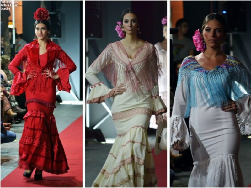 Modelos en trajes de flamenca en una pasarela de moda.