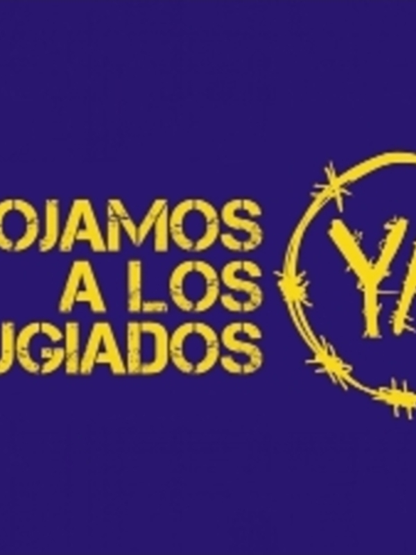 Muestra de texto 'ACOJAMOS A LOS REFUGIADOS YA!' con un círculo de alambre de púas en el fondo azul.