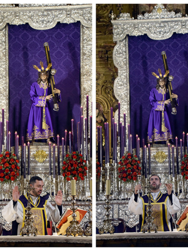 Sacerdote oficiando una misa en un altar ornado con velas moradas y flores rojas, en un contexto religioso y solemnemente decorado.