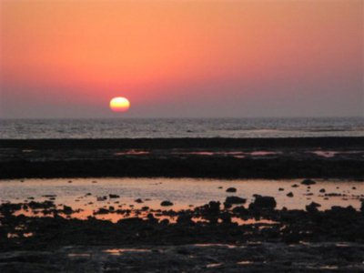Puesta del Sol hoy en Chipiona frente Santuario de Regla 