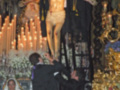 Procesión religiosa con imagen del Cristo de la Buena Muerte en Sevilla, España.