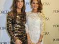Dos mujeres posan en un evento con vestidos de noche, uno dorado con lentejuelas y otro blanco con encaje. La imagen tiene un fondo con el logotipo de Porcelana.