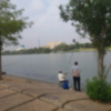 Pescadores en el río
