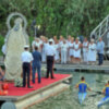 La Virgen del Carmen  navegó  el  Guadalquivir con ofrenda de flores de las instituciones deportiva a la orilla derecha del río