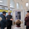La Asociación Amigos del Camino de Santiago de Sevilla visita la exposición filatélica jacobea en Correos